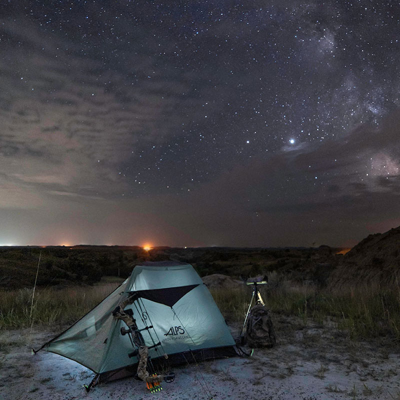 Tent with stary night sky above