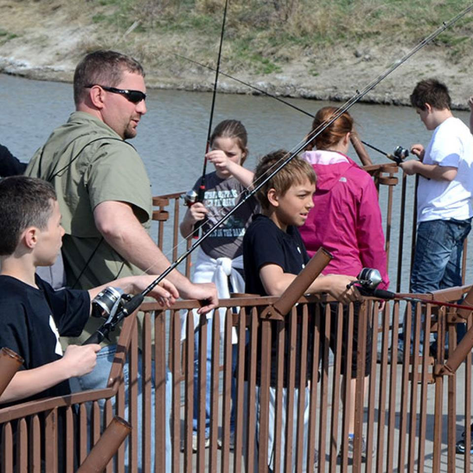 Kids on a dock fishing