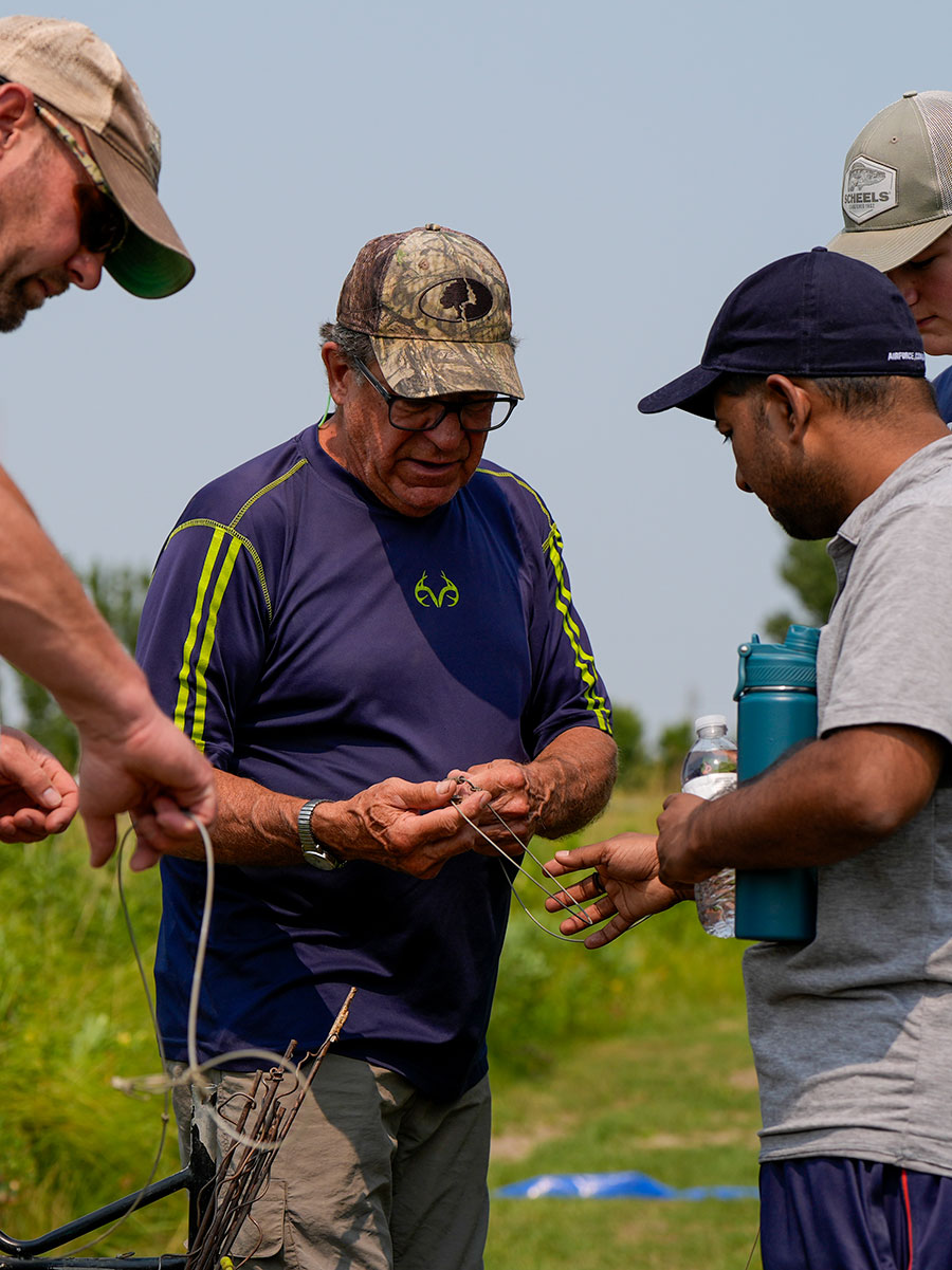 Instructor demonstrating setting a trap