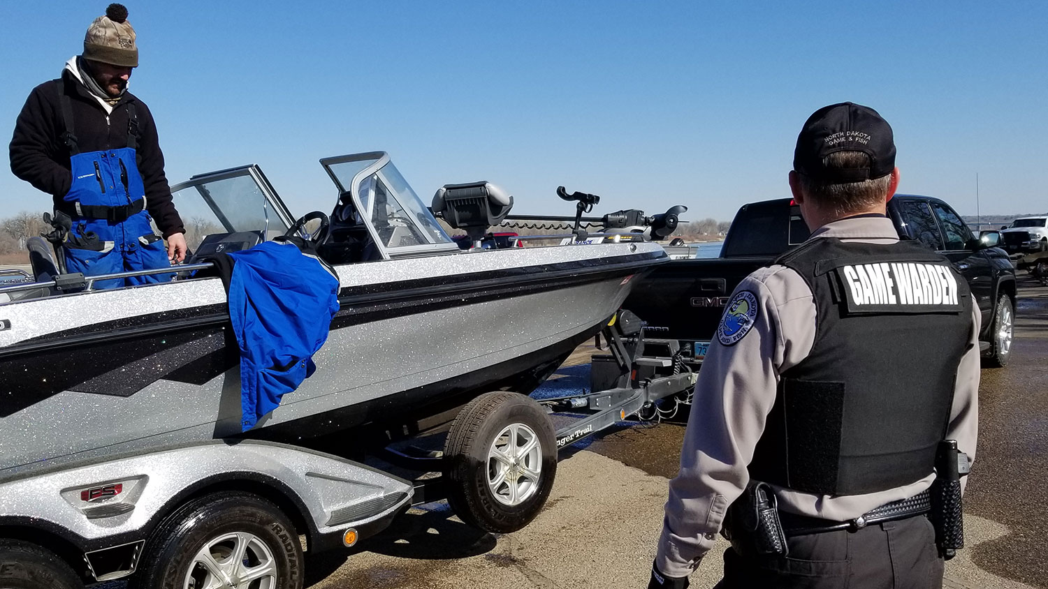 Game warden near boat