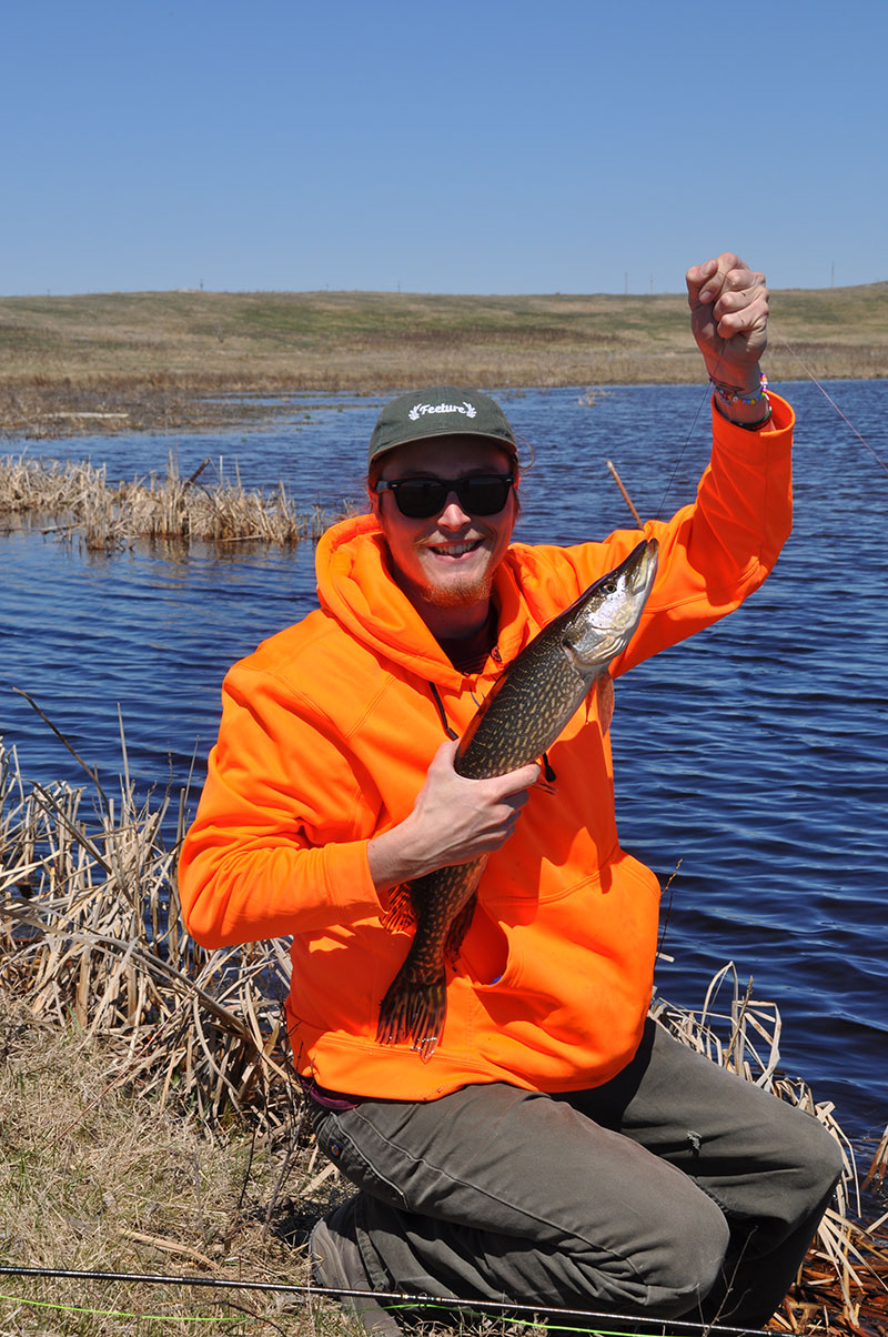 Angler with Northern Pike