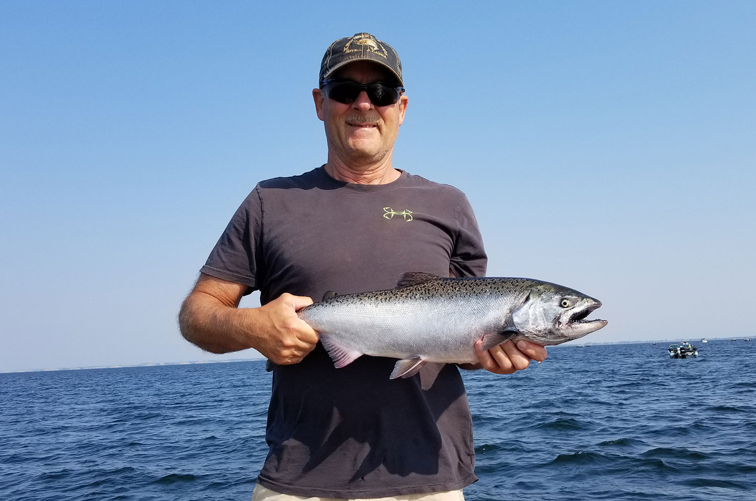 Angler with salmon