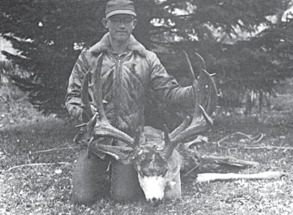 Teenager with deer he shot