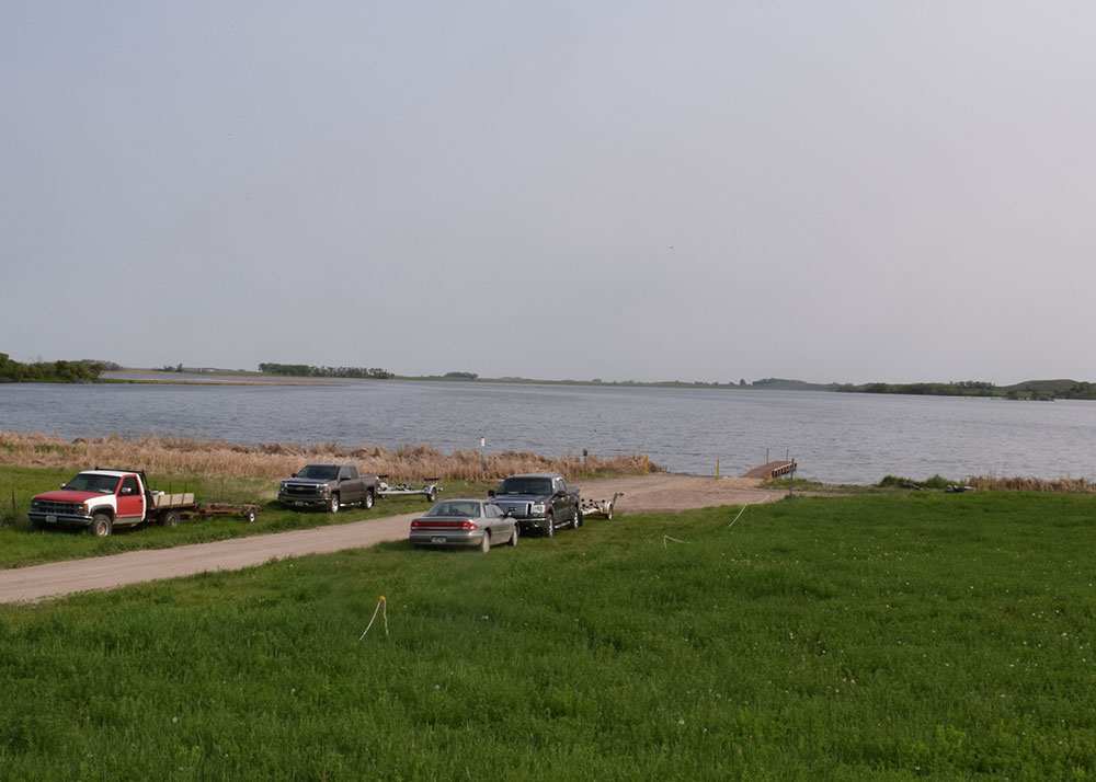 Vehicles parked at Lake Addie near Binford in Griggs County.