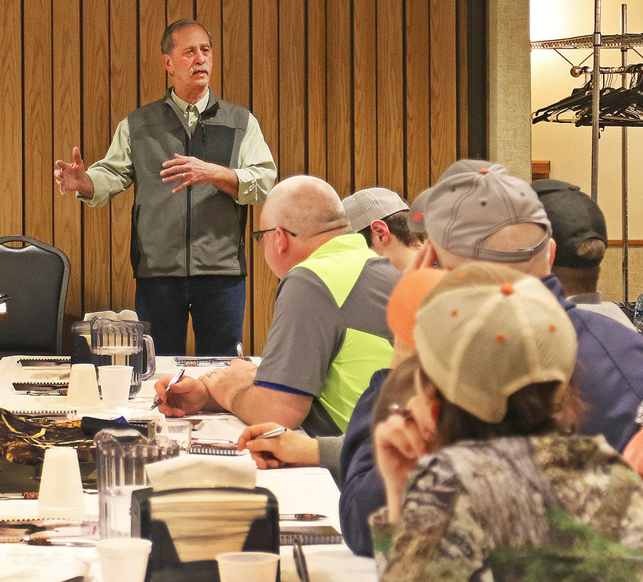 Director of Department speaking at a meeting