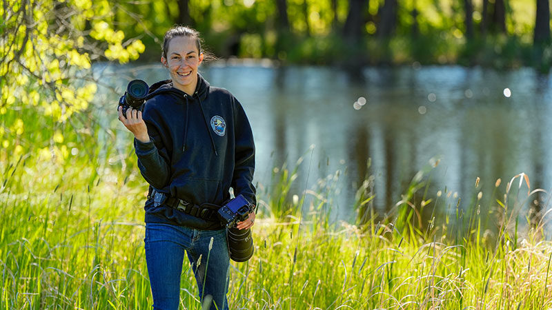 Photographer Ashley Peterson in the field