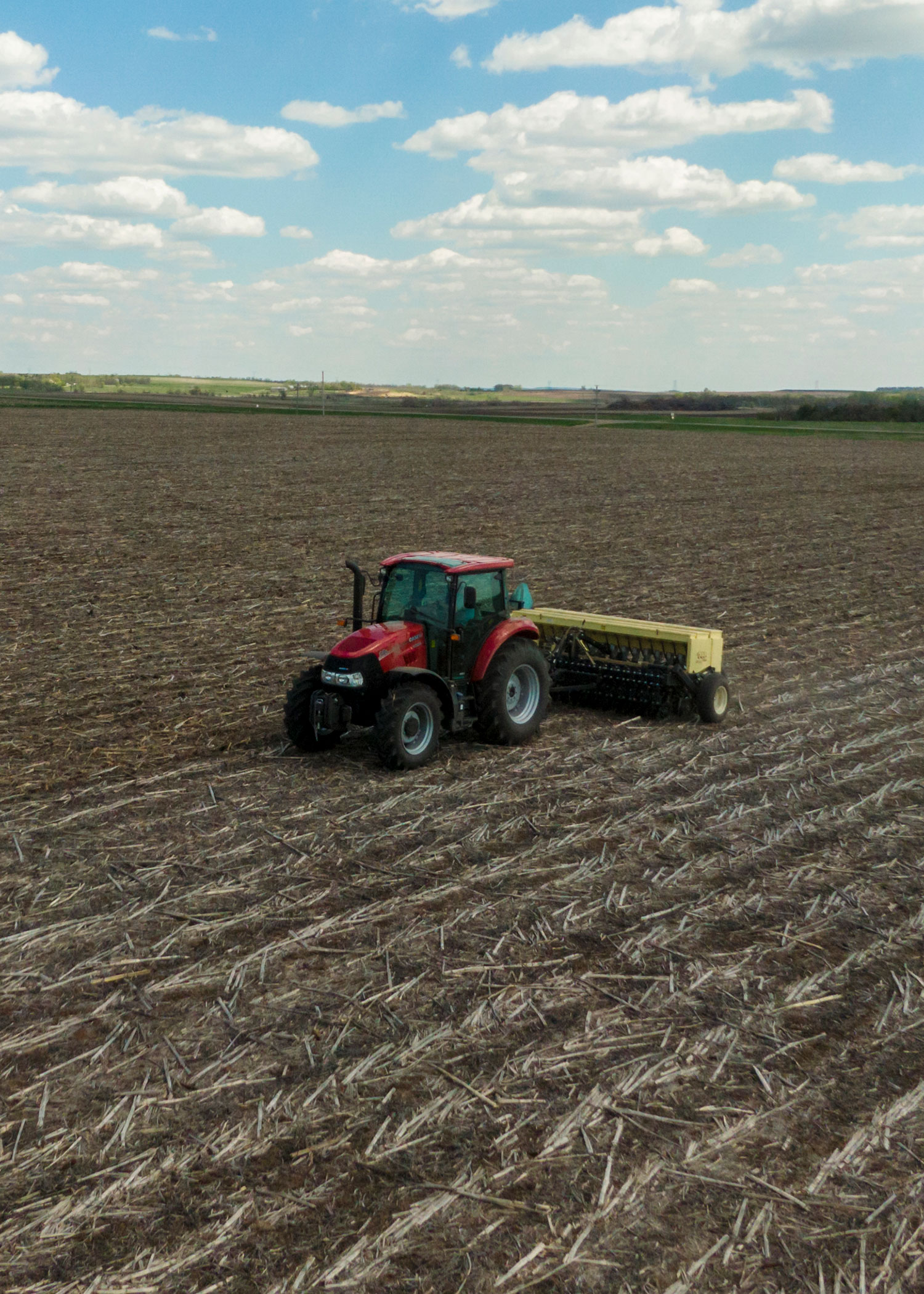 Tractor working field on WMA