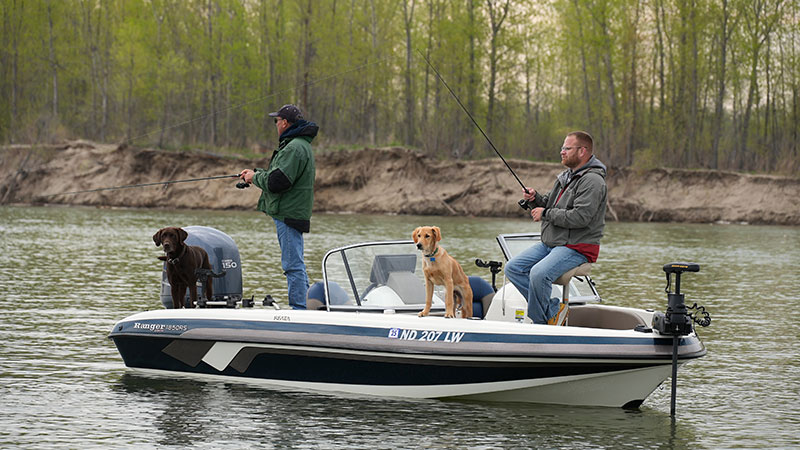 People fishing from boat