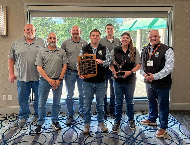 PLI team with award
