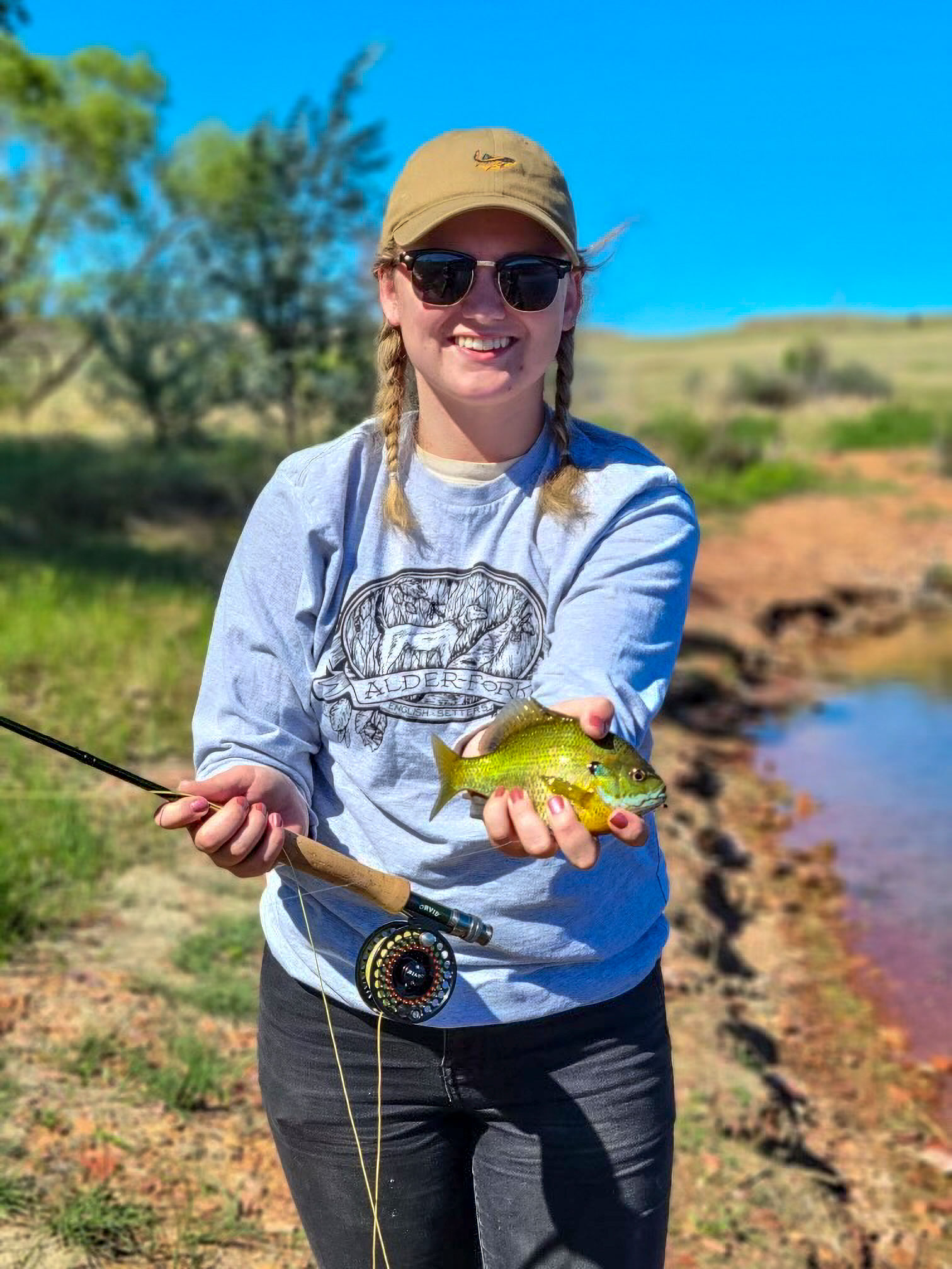 Angler holding fish