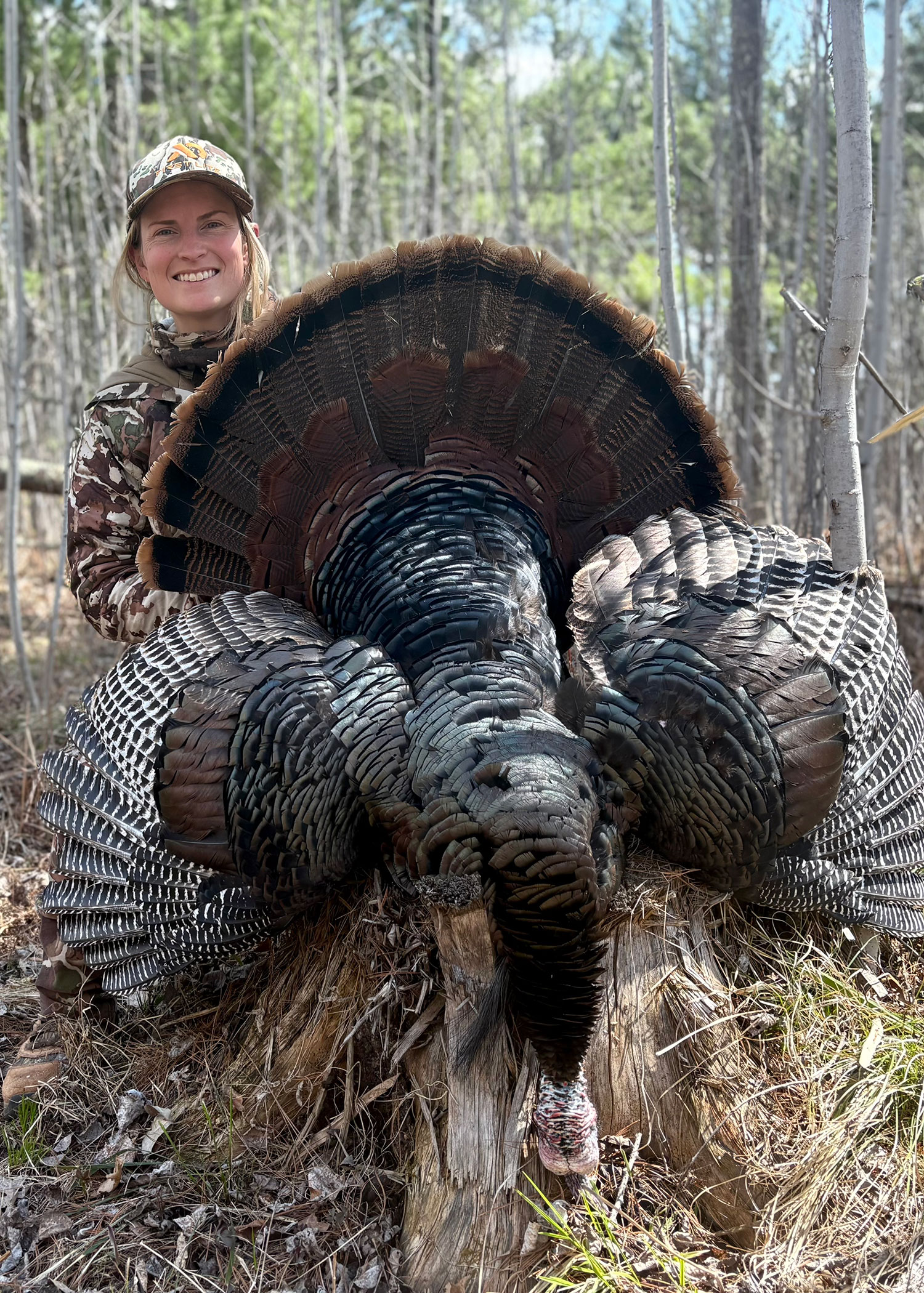 Cayla Bendel with harvested turkey