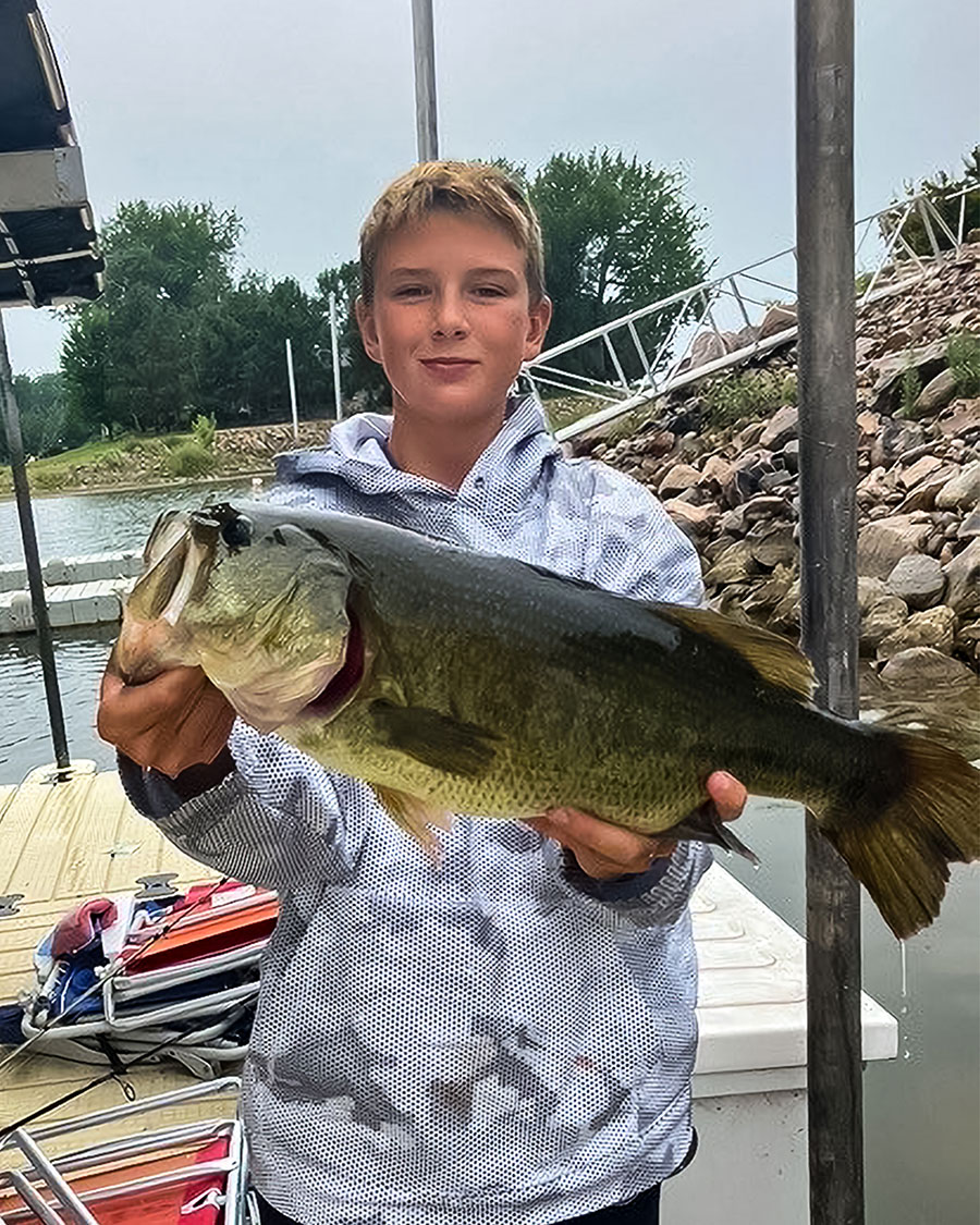 Hill holding bass