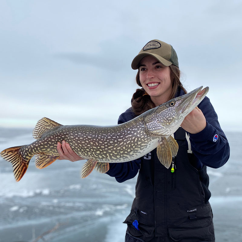 Woman holding pike