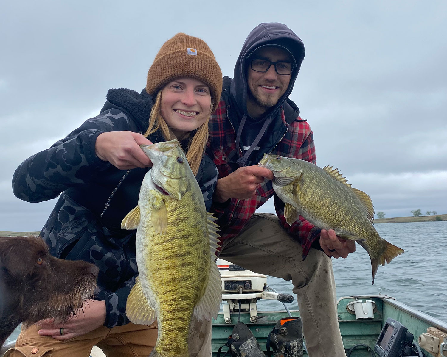 Cayla and her husband with more fish