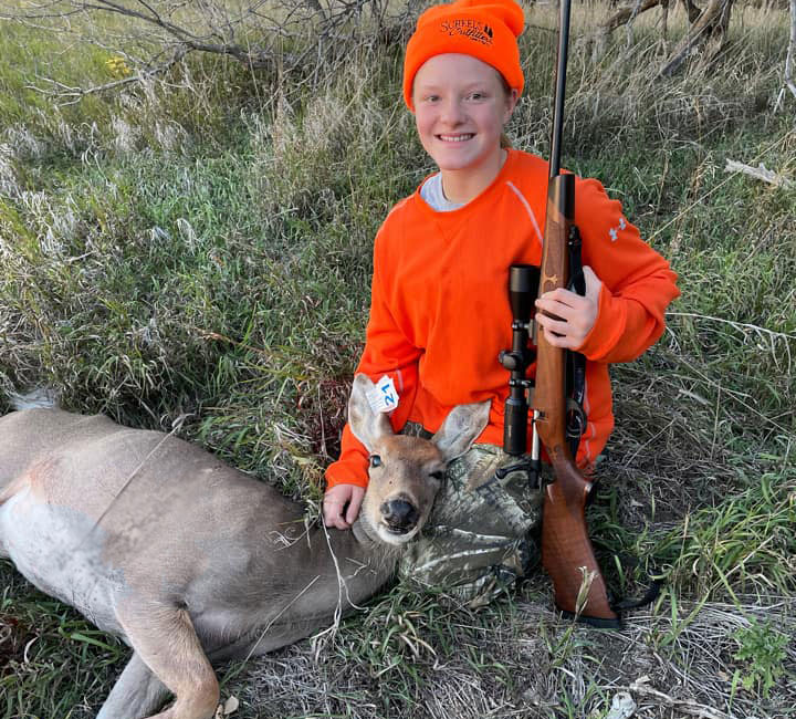 Brandon Sailer's daughter with her first deer