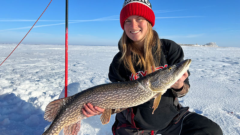 Cayla holding speared pike