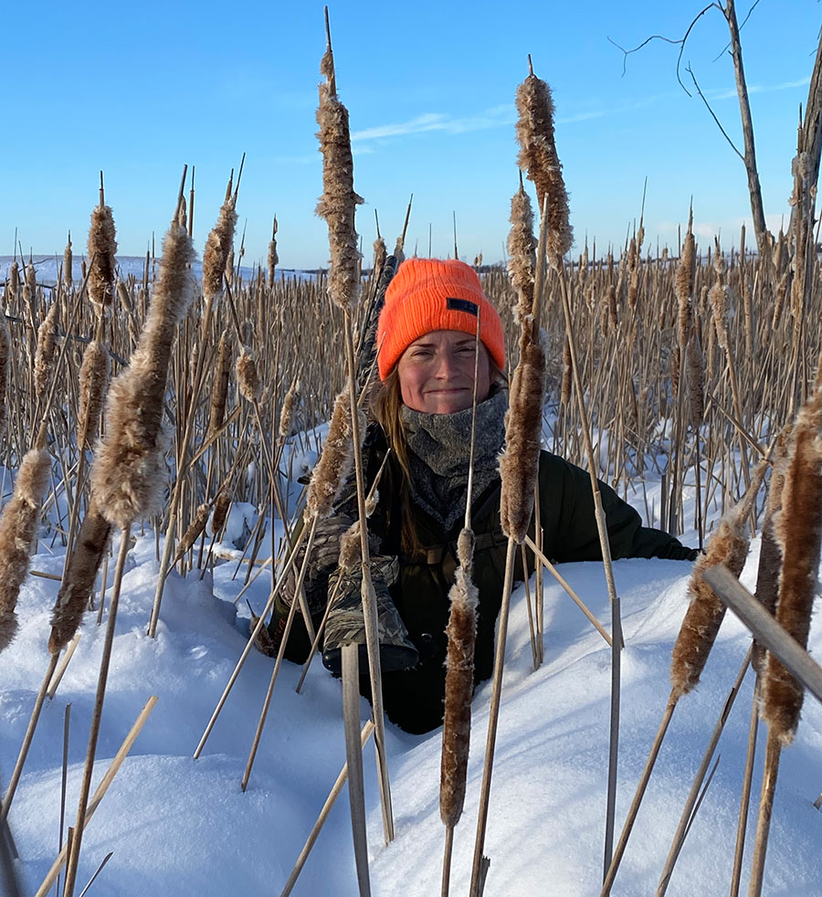 Author hunting in deep snow and cattails