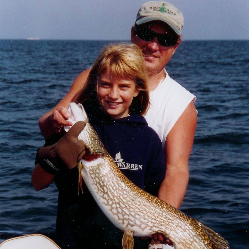 Cayla and her dad with the pike she caught
