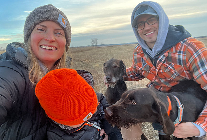 Finley and Rhett and the family in the field