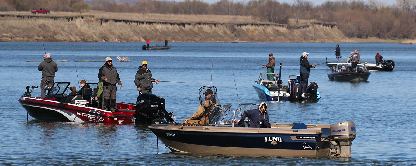 Anglers in boats on lake