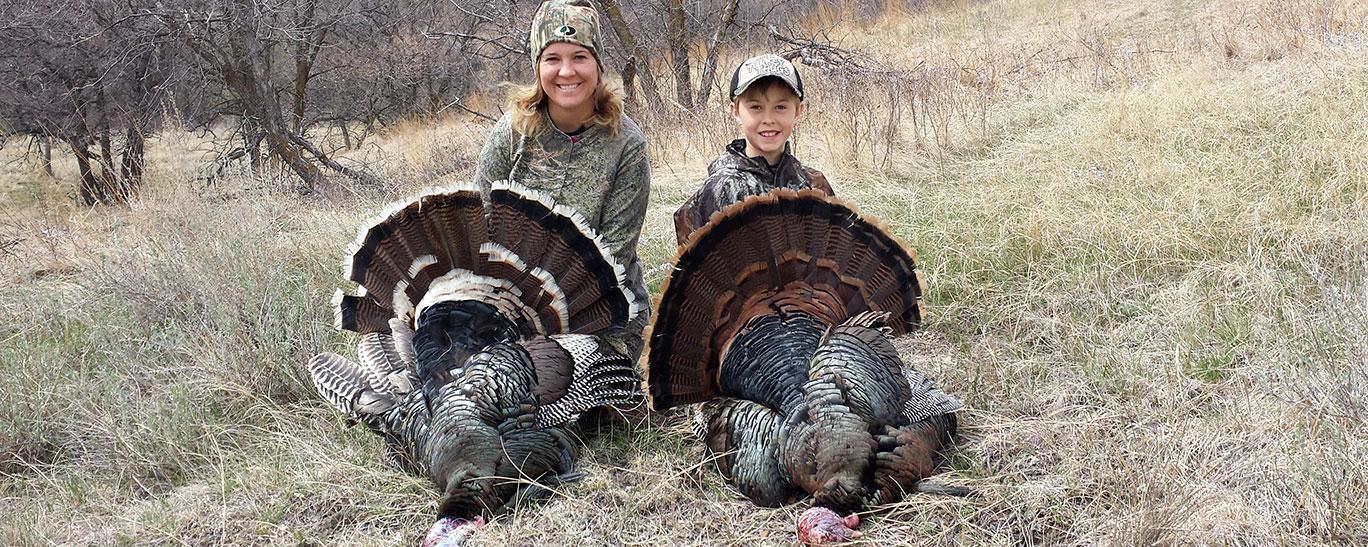Mom and kid with turkey