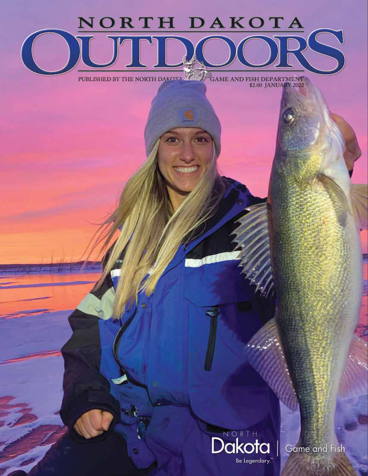 2022 January Outdoors cover of woman holding a fish caught while ice fishing