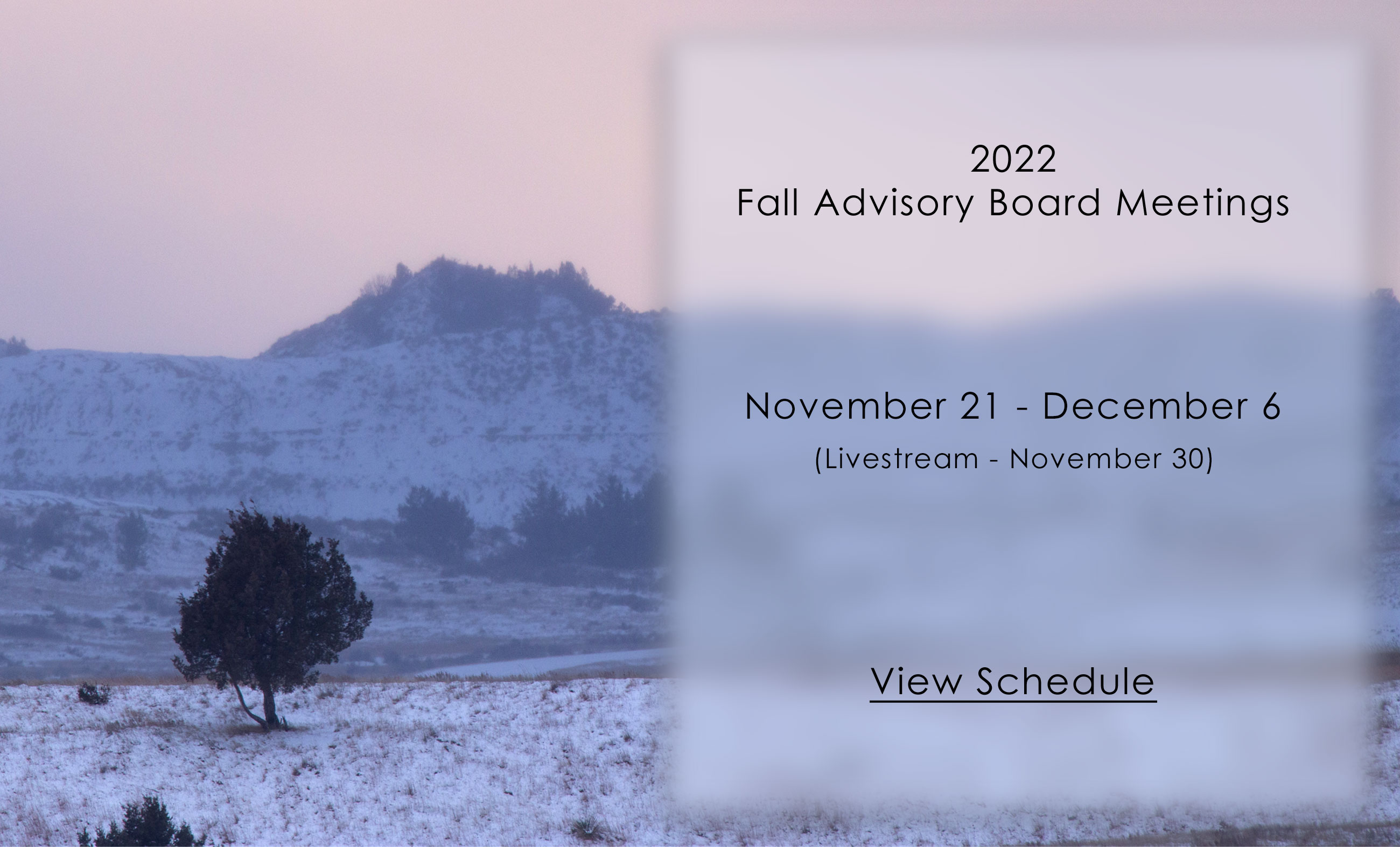 Snowy badlands with text graphic overlay
