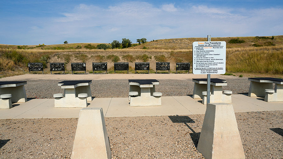 Firing range with rules sign in front