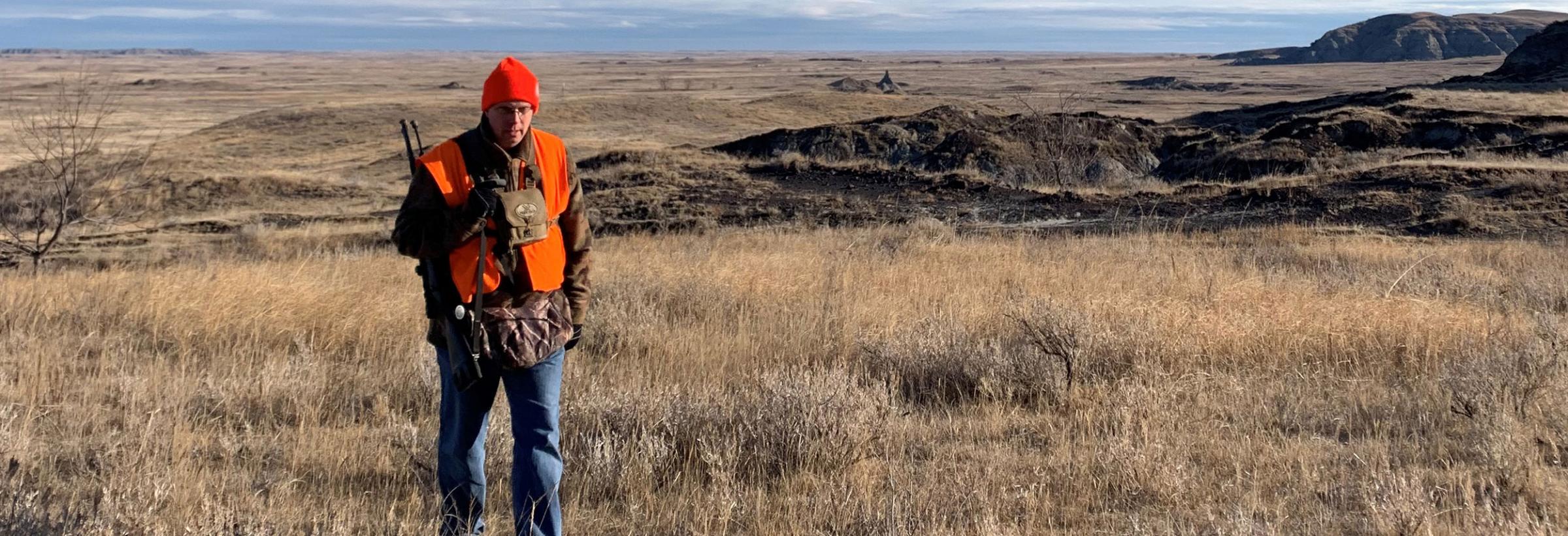 Randy Meissner walking in the field