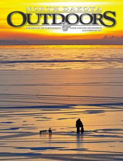 Magazine cover photo of person ice fishing