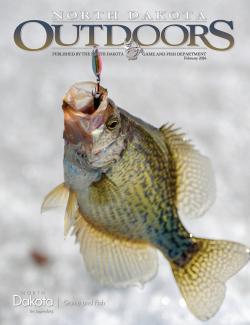 NDO Feburary 2026 - Cover, hooked crappie with ice in background