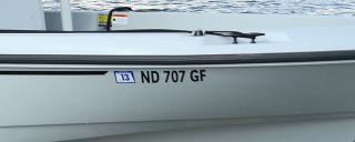 Registration numbers on boat