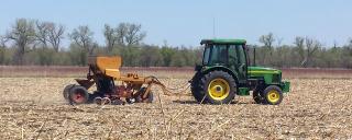 Tractor and equipment working field