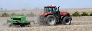 Tractor tilling field