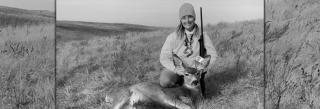 Hunter with doe she harvested