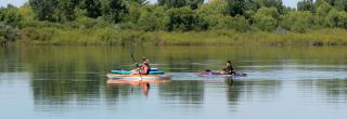 Three people kayaking