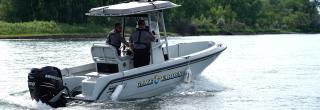Wardens on boat