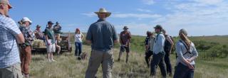 People in field for workshop