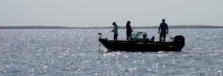 People on boat fishing