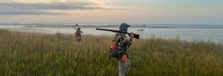 Two hunters on the prairie