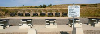 Firing range with rules sign in front