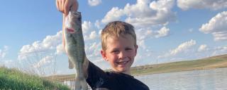 Rodney holding fish