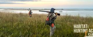 Hunters in a field
