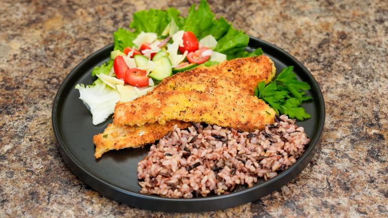 Parmesan crusted walleye with salad and rice