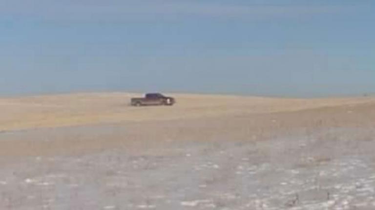 Truck caught on trail camera trespassing