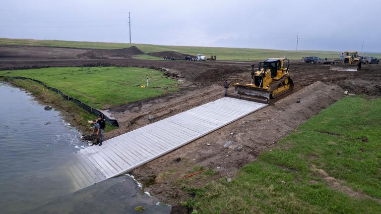New ramp being pushed into water