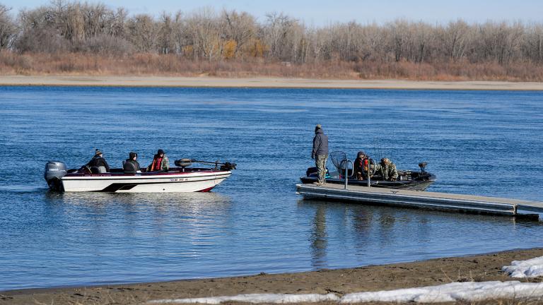 Two boats near a boat dock