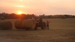 Hunter talking to farmer