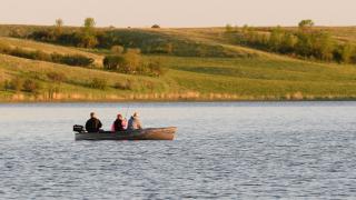 People in a boat on a ND lake
