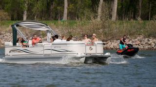Boat and jetski on the water